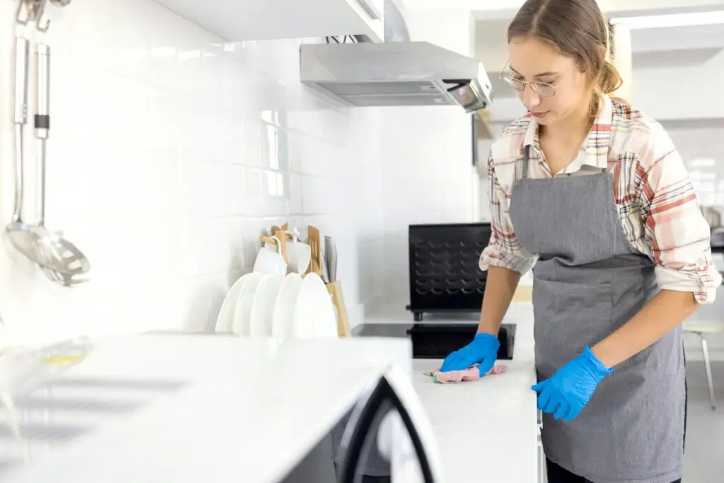 woman cleaning her kitchen