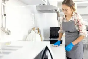 woman cleaning her kitchen