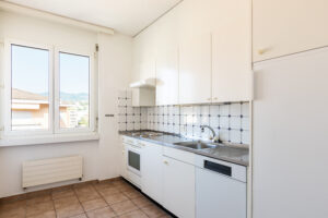 Kitchen with white and tile vintage furniture | House Cleaning Rapid City South Dakota